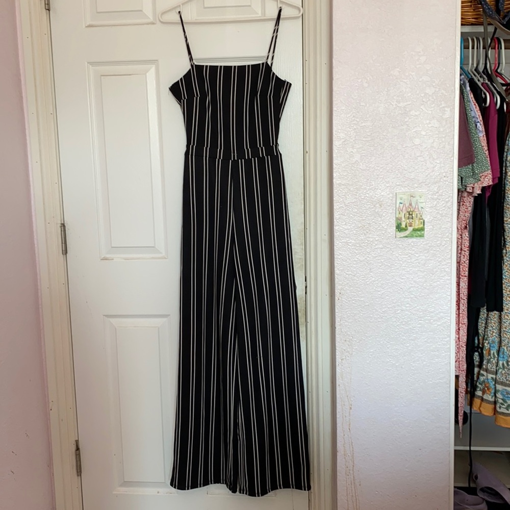 Mind Code, small, black and white sleeveless jumpsuit with a key hole